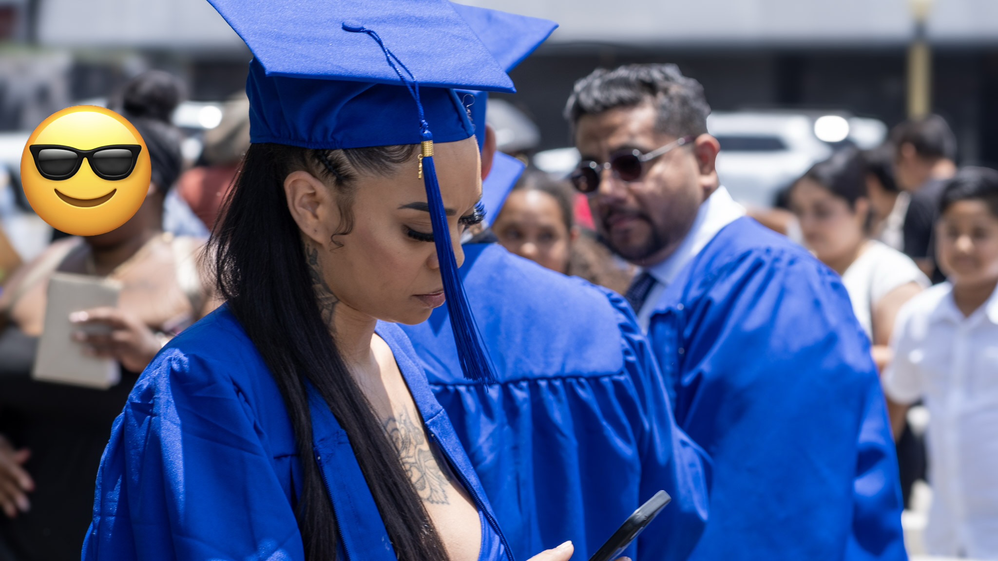 Graduate walking proudly after receiving diploma