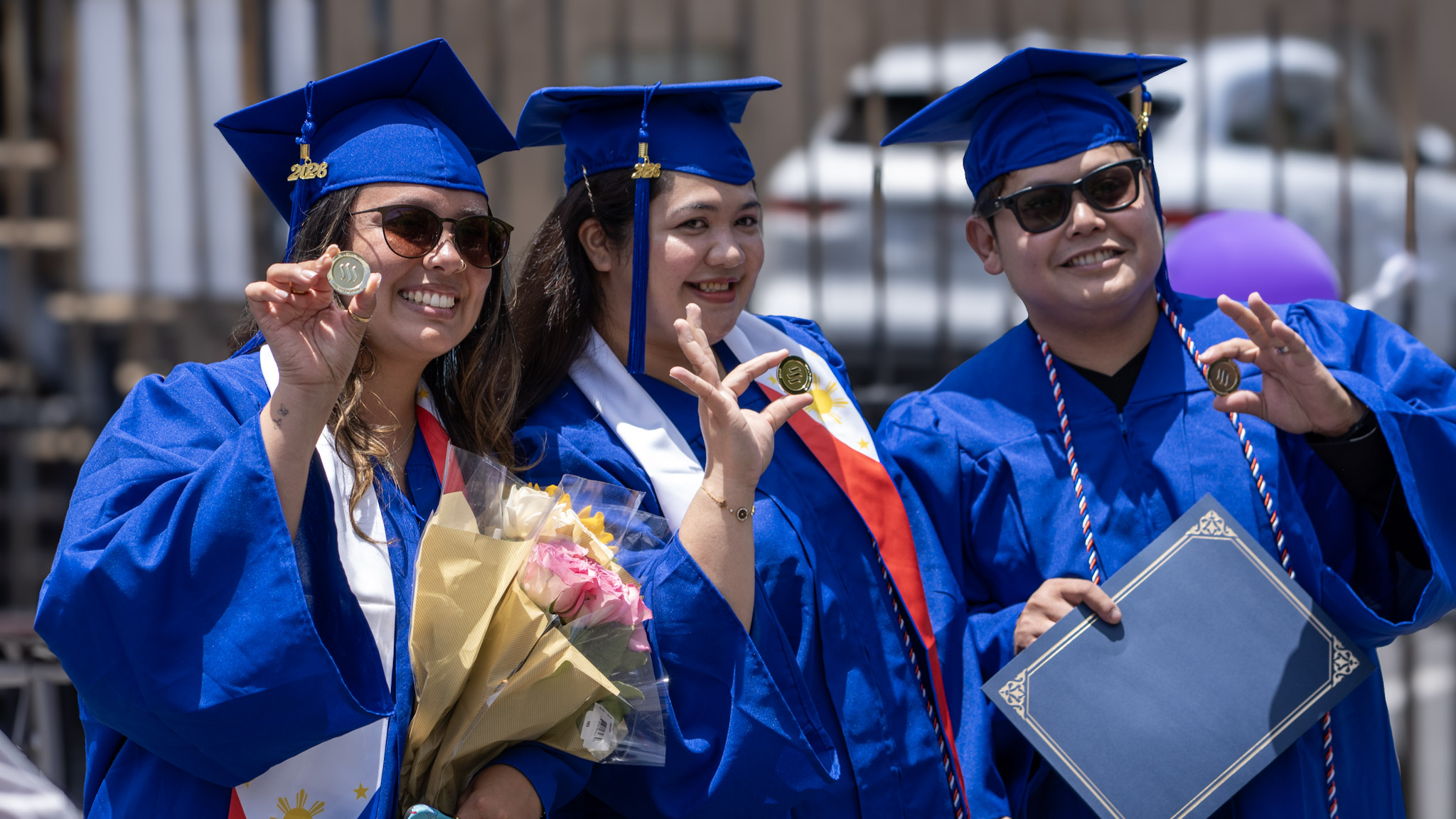 Graduate with family at the WMTC graduation celebration
