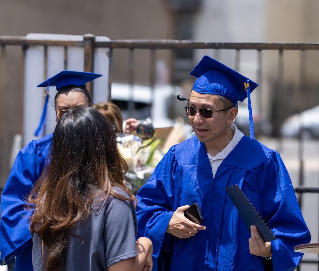 Graduate with diploma after the ceremony