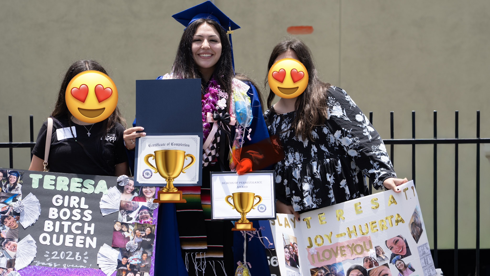 Graduate with family celebrating after commencement